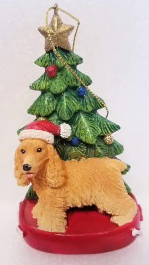 Cocker Spaniel Dog Sitting by Christmas Tree